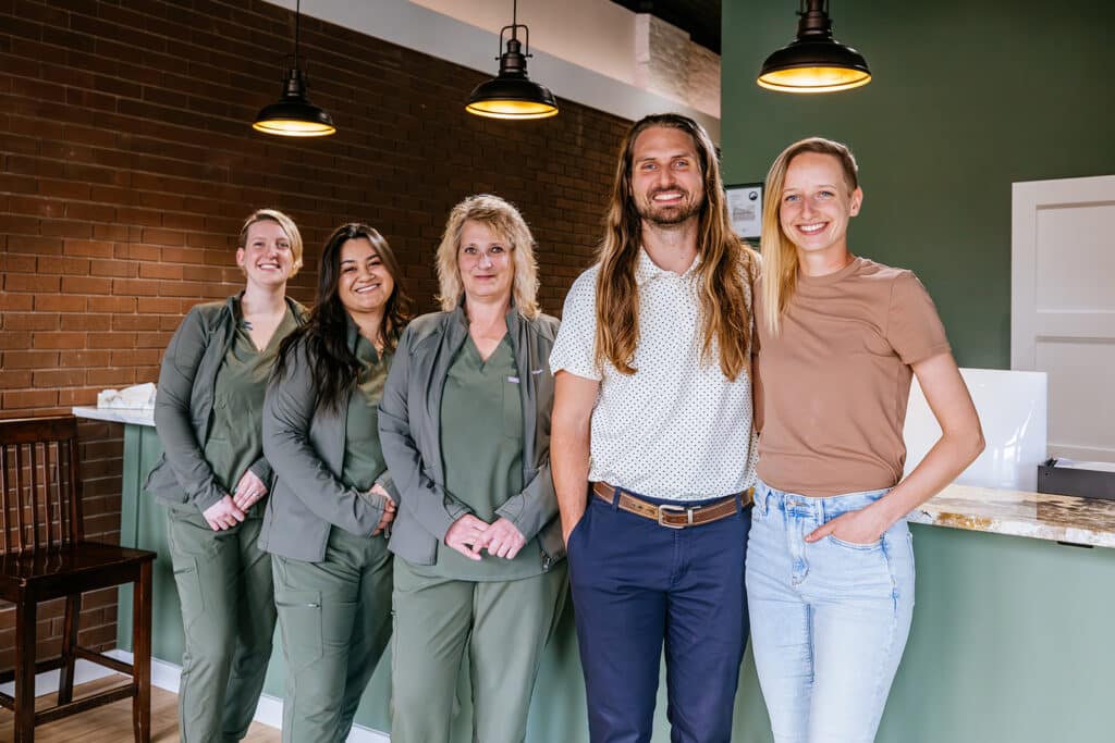 Brand photography of a chiropractic team inside their Butte, Montana clinic, created for marketing and website use.