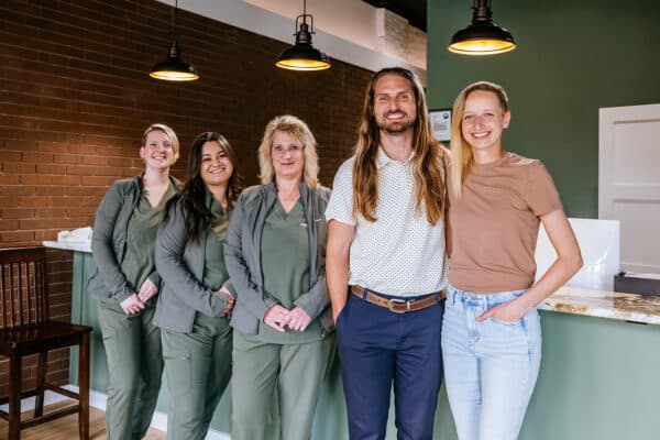 Brand photography of a chiropractic team inside their Butte, Montana clinic, created for marketing and website use.