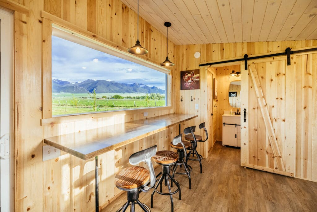 Montana Short term rental photography showing view through a large window looking at mountains