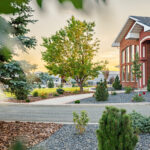 Front yard landscape design with layered plantings at a rural Montana home