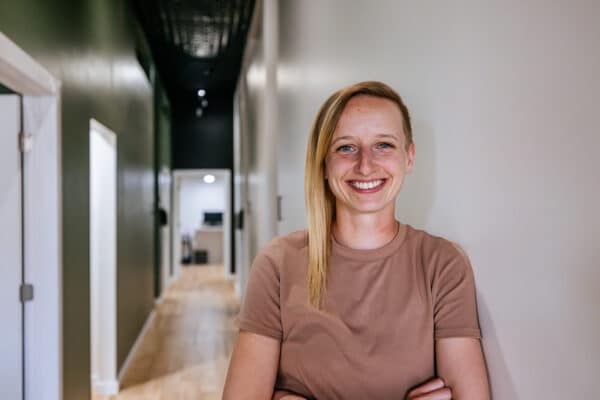 Professional brand portrait of a chiropractor photographed inside a clinic in Butte, Montana.