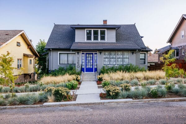 Landscape architecture photoshoot showing front face of home with beautiful plantings