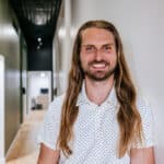 Brand portrait photography of a chiropractic team member inside a healthcare clinic in Butte, Montana.
