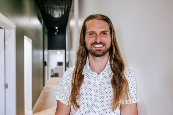 Brand portrait photography of a chiropractic team member inside a healthcare clinic in Butte, Montana.