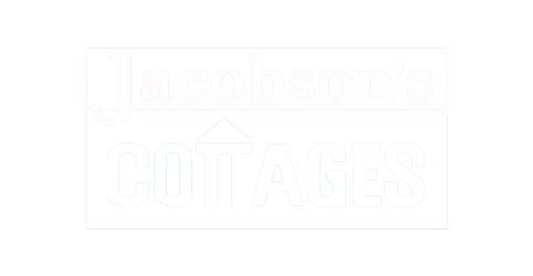 Jacobson's Cottages logo, white
